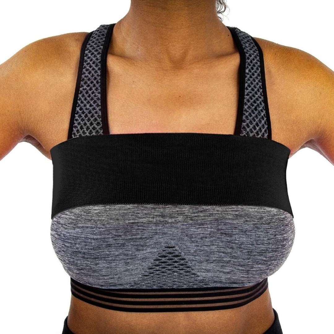 Lady wearing a compression support band over top of her breasts