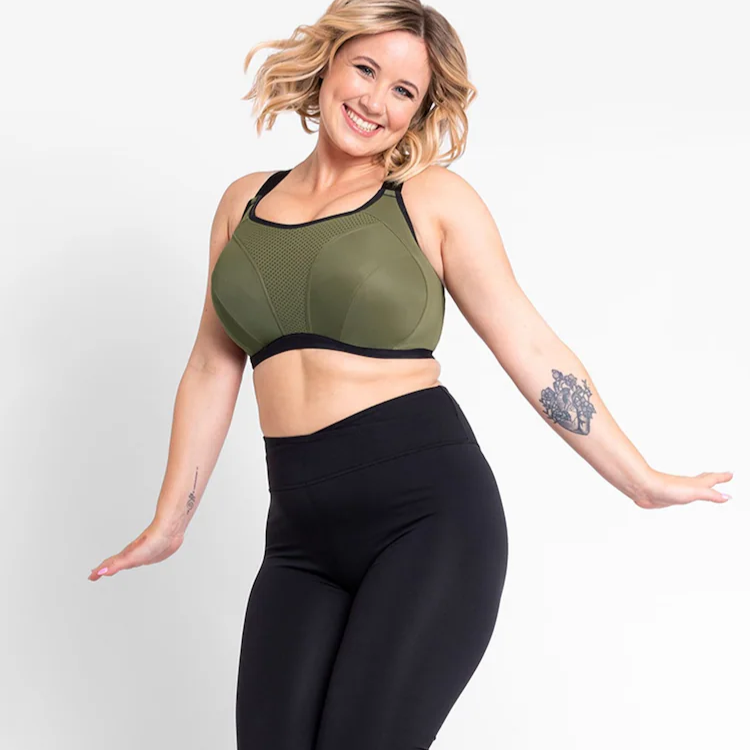 model wearing Curvy Kate Everymove Wired Multiway Sports Bra jumping